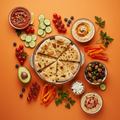 Mezze platter with pitta bread, muhammara and baba ganoush on a warm orange background